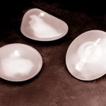 Silicone gel-filled breast implants